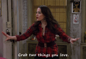 Kat Dennings saying &quot;grab the two things you love&quot; and grabbing her own boobs