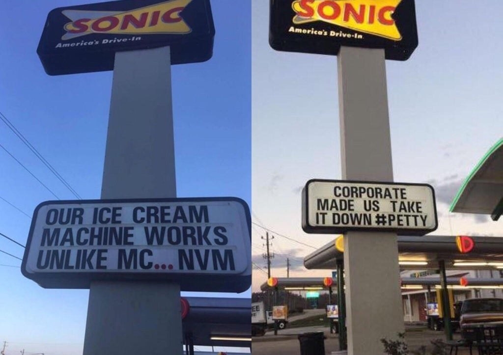 An ice cream machine war between two signs