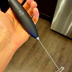 A customer review photo of the Zulay Original Milk Frother.