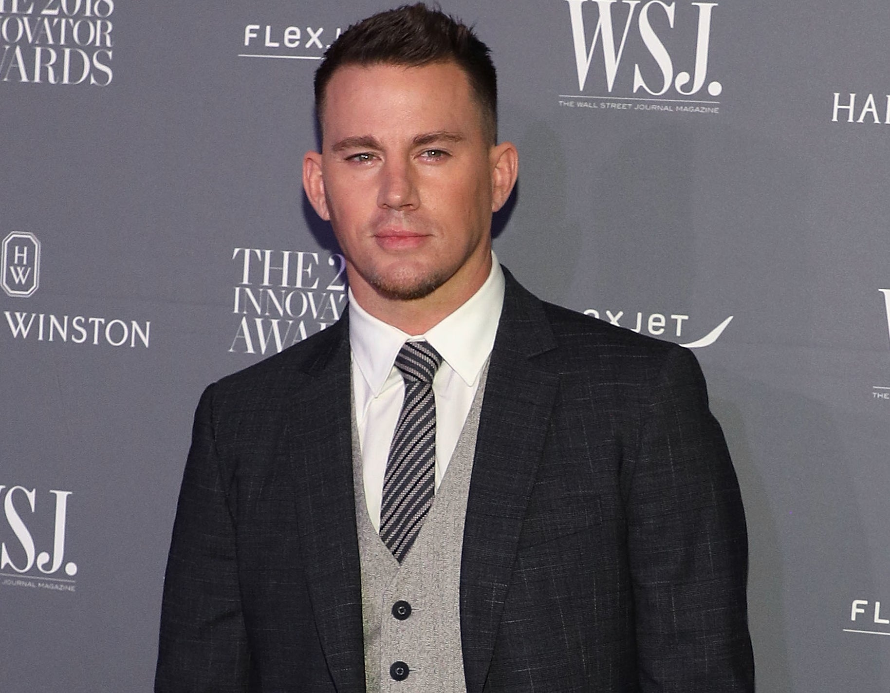 Channing looks serious in a slightly different suit