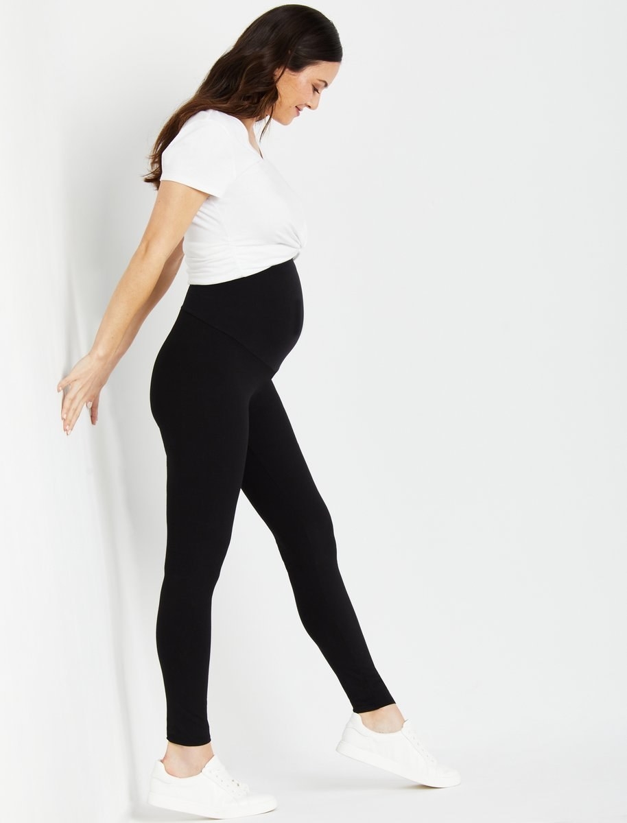 Model wearing the maternity leggings in black