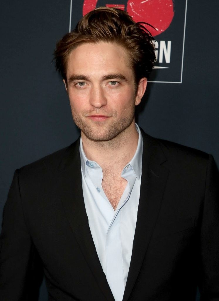 Robert Pattinson posing on the red carpet