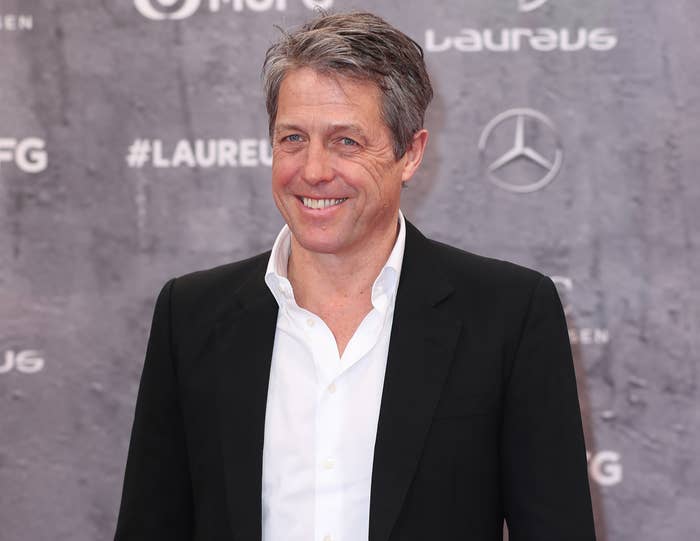 Hugh smiles while recently attending an event