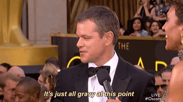 Matt Damon being interviewed on the Oscars red carpet 