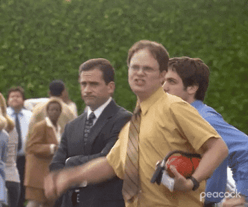 Gif of Dwight from &quot;The Office&quot; fist pumping and jumping excitedly