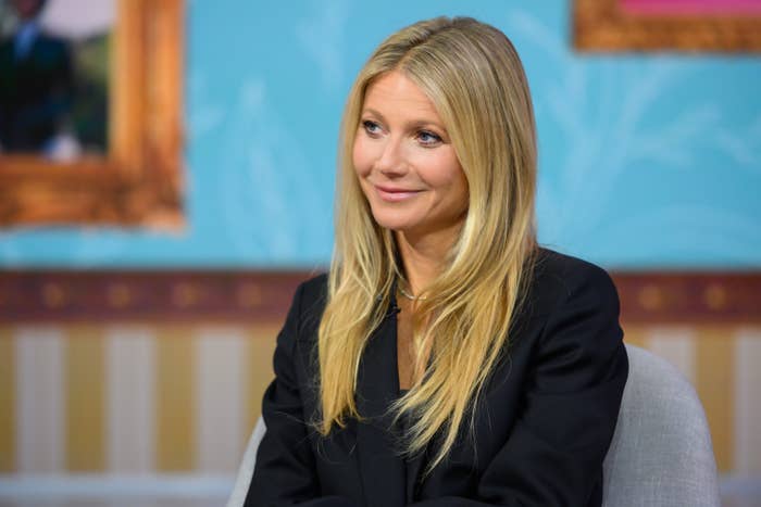 Gwyneth smirks a little during an interview