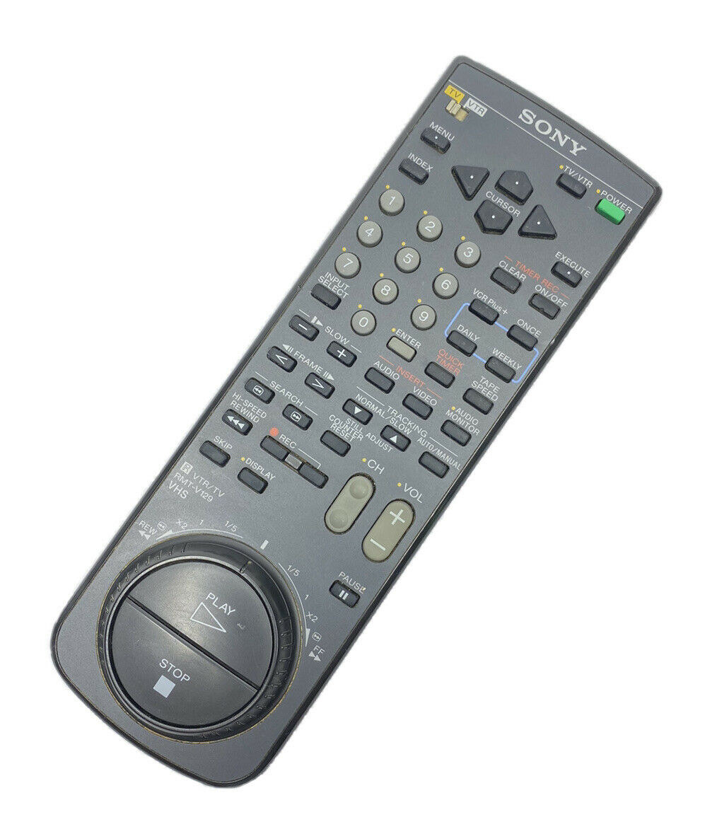A 90s style VCR remote with lots of buttons