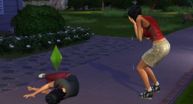 A male sim laying on the ground dying while a woman sim stands over him weeping