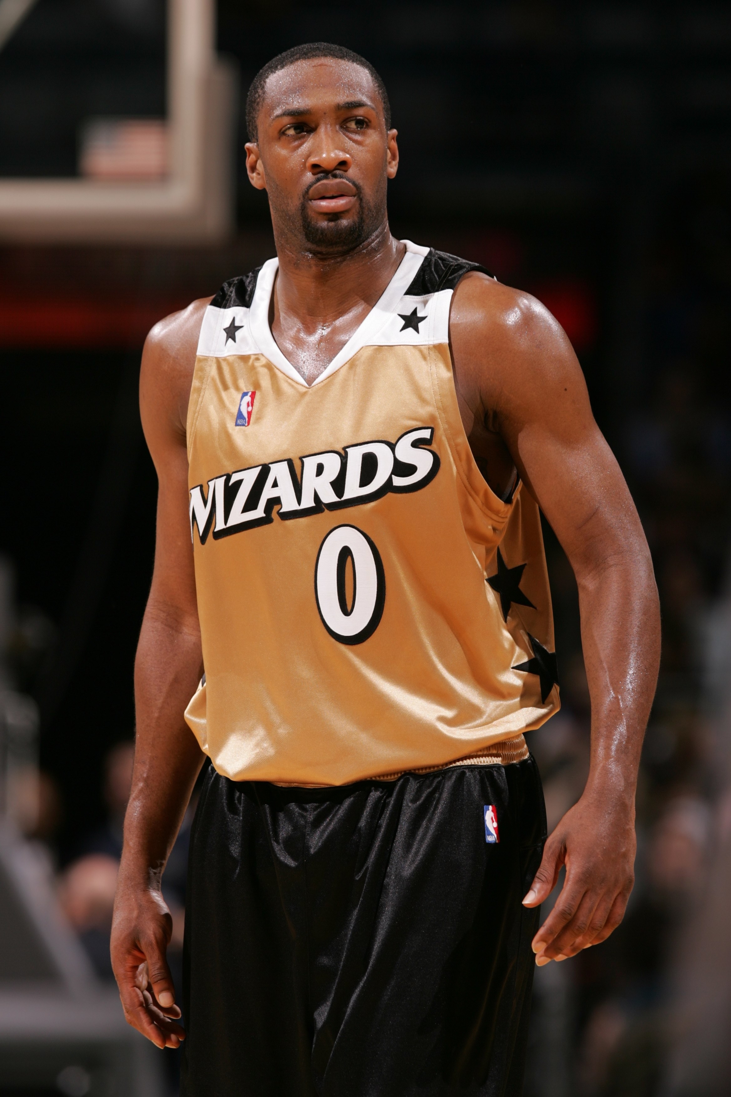 Gold Wizards uniform with black stars and white outlining