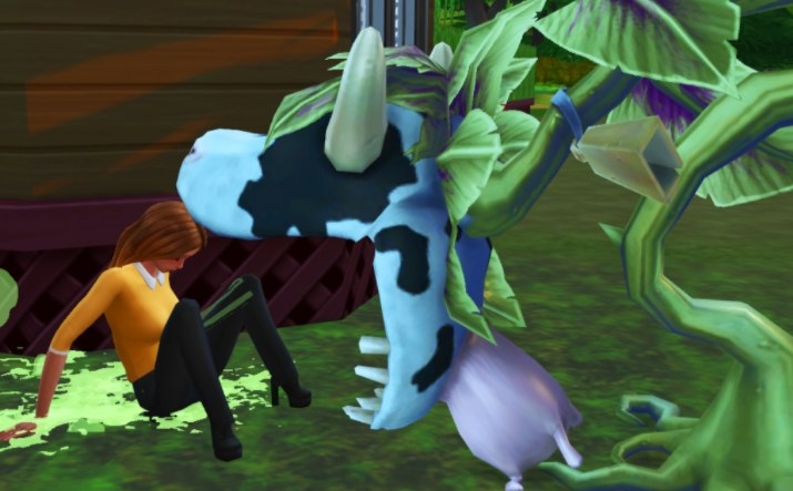 A giant cow plant about to eat a sim woman