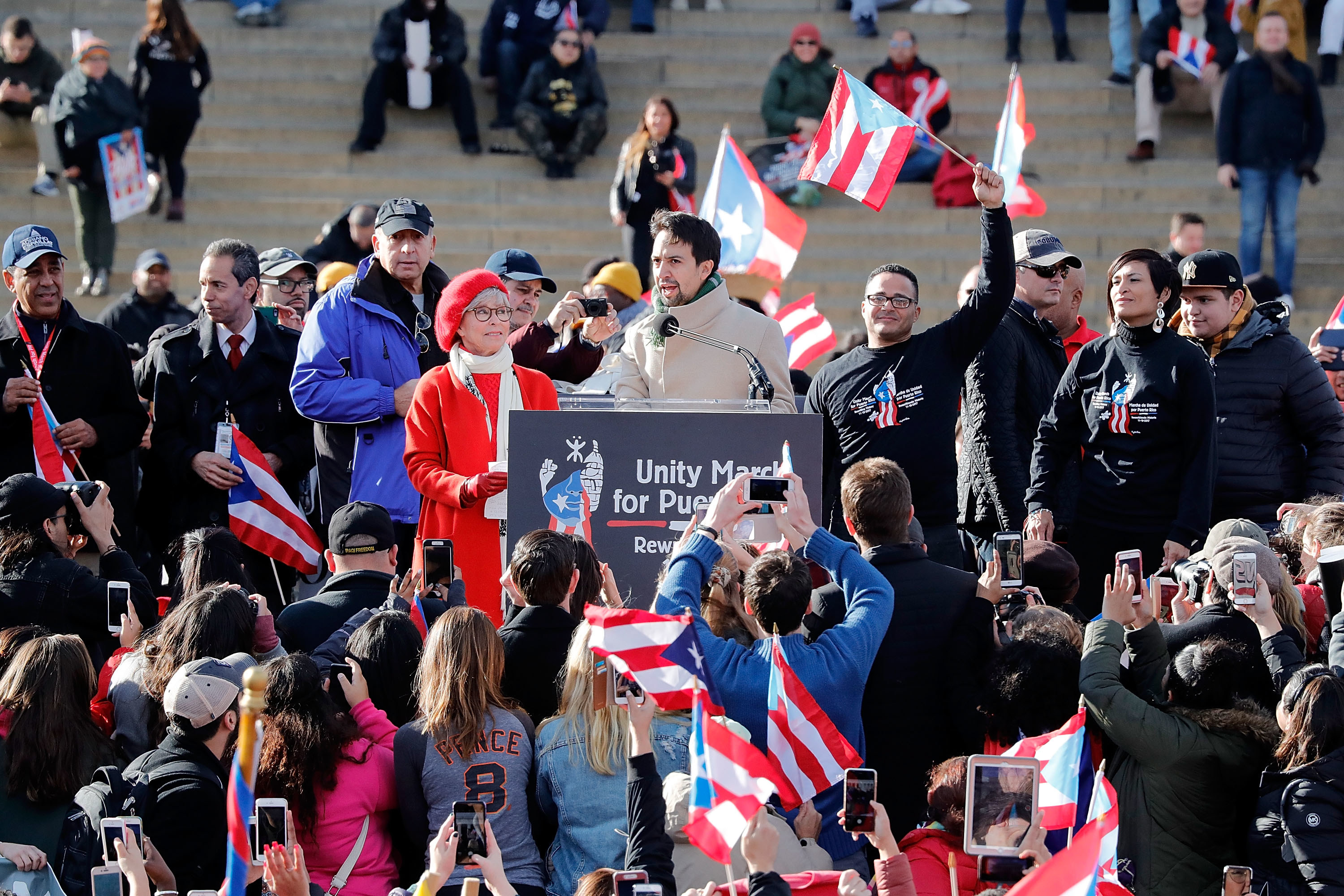 Rita Moreno and Lin-Manuel Miranda (C) speak at a Unity for Puerto Rico rally at the Lincoln Memorial on November 19, 2017 in Washington, DC