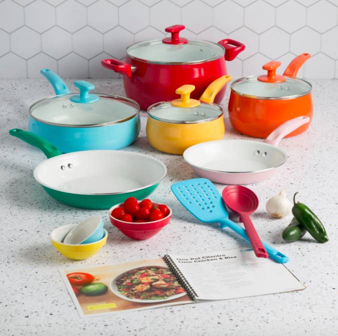 A full set of cookware arranged on a kitchen counter