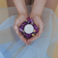 Model holding clitoral balm