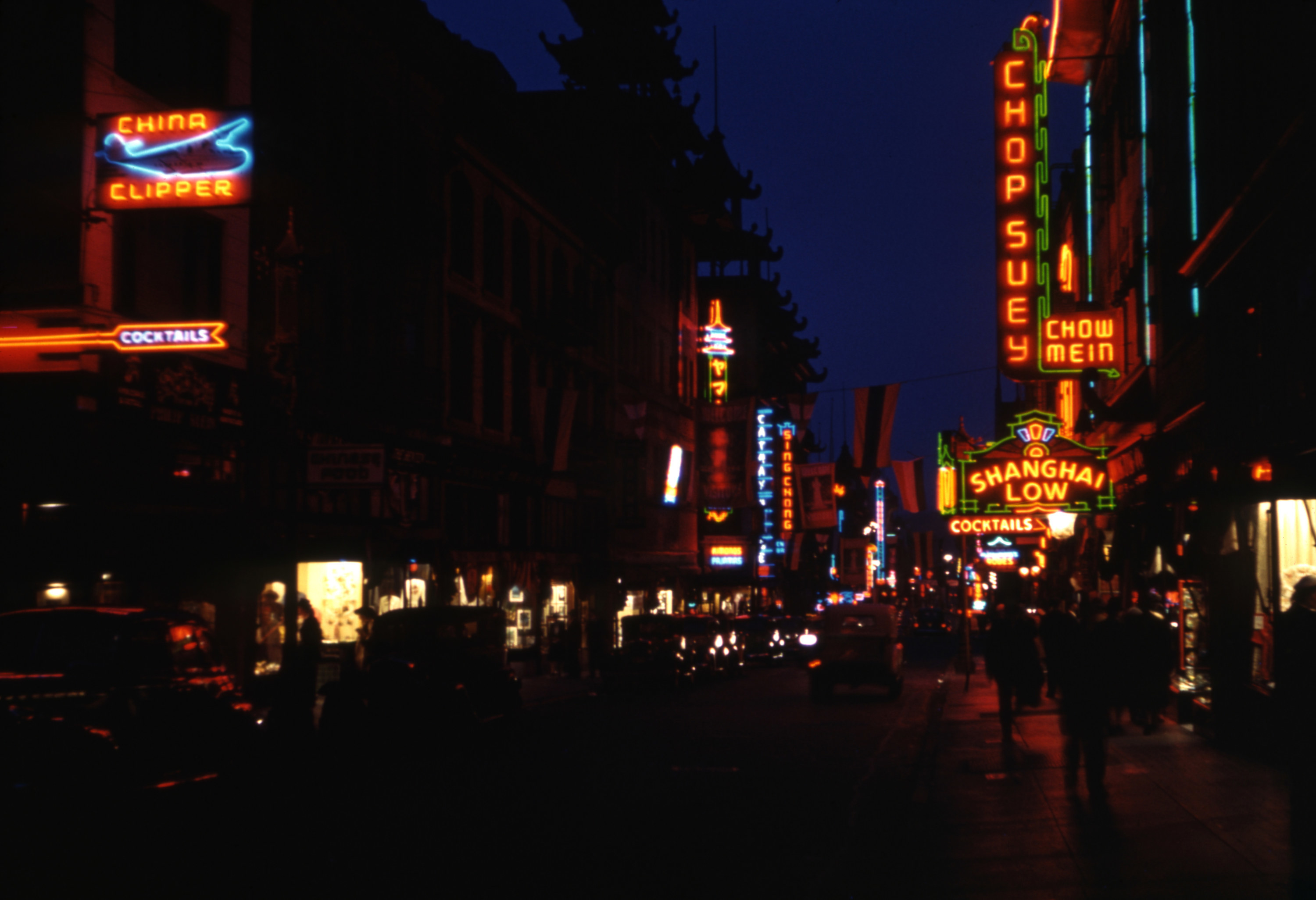 A busy street with a bar