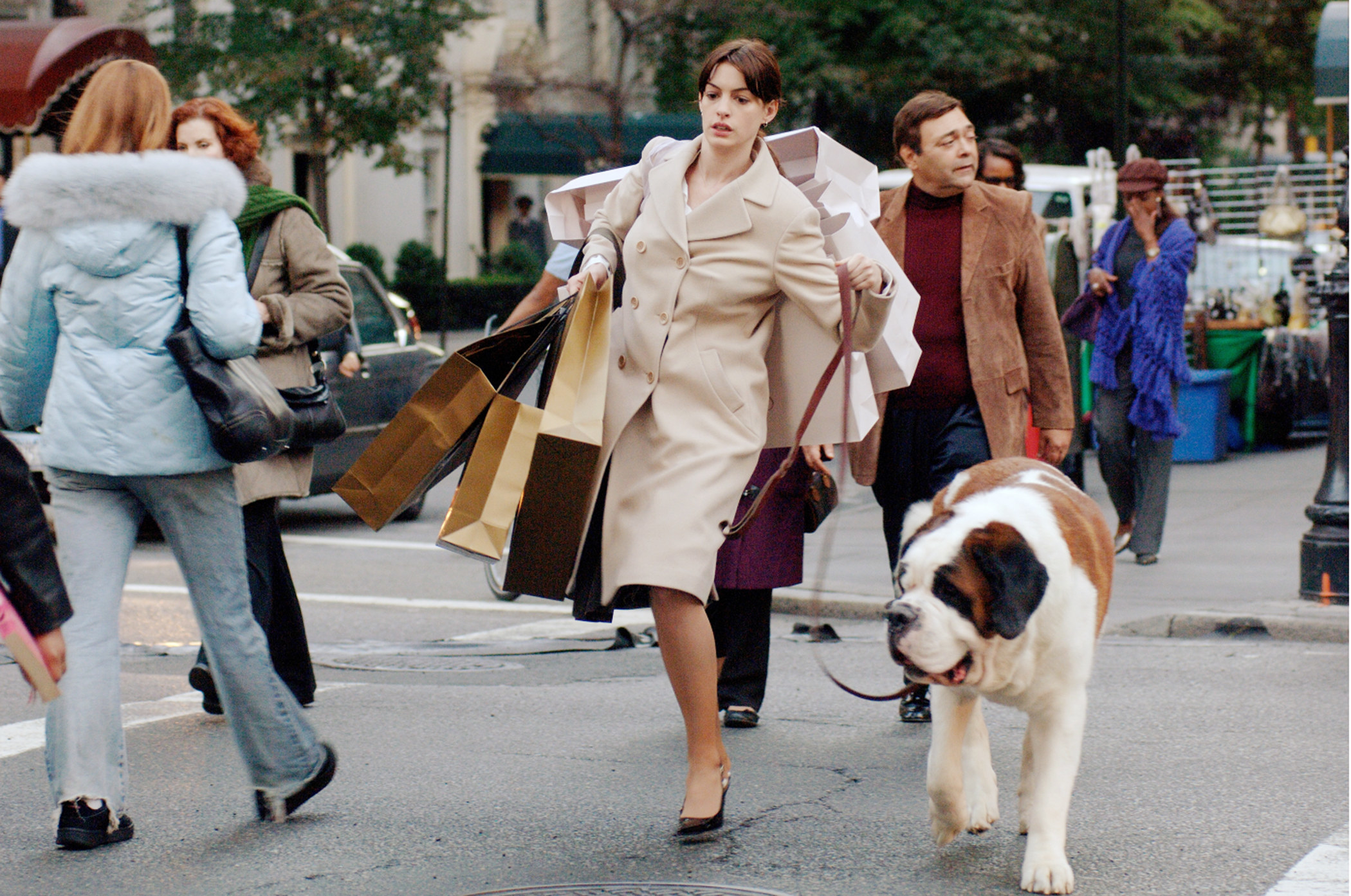 Anne Hathway walks a big dog and carries an absurd number of bags on set of &quot;The Devil Wears Prada&quot;