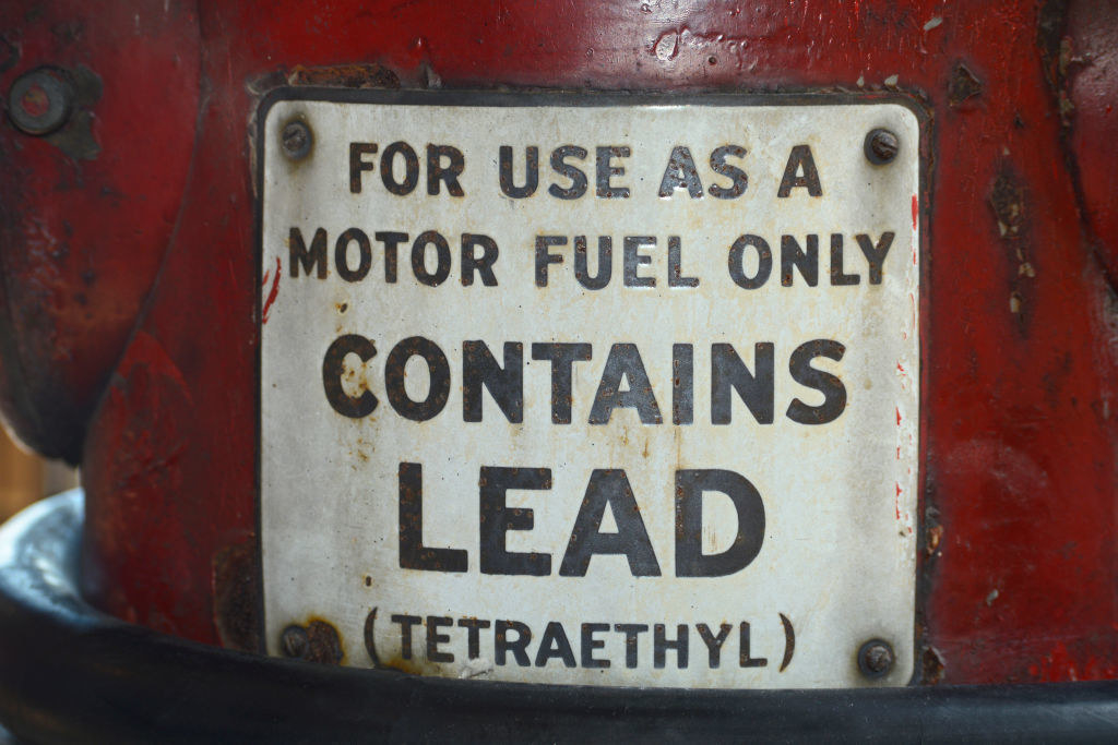 motor fuel with a label saying it contains lead