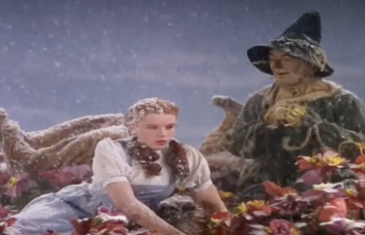 snow falling on Dorothy and the Scarecrow in The Wizard of Oz