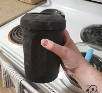 hand holding the black hyperchiller frosted from the freezer