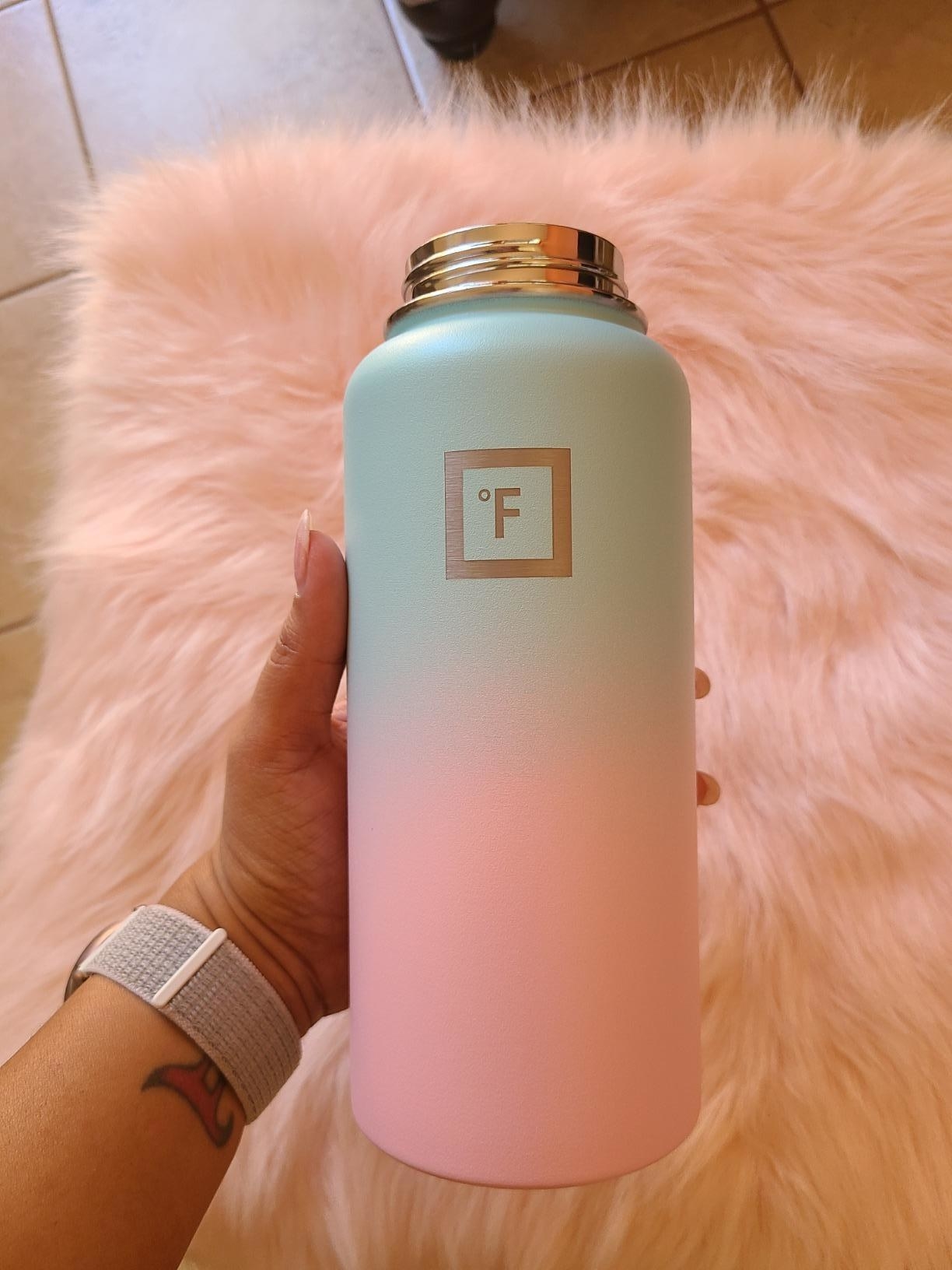 metal bottle with pink and blue gradient 
