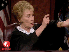 Judge Judy furiously tapping her watch