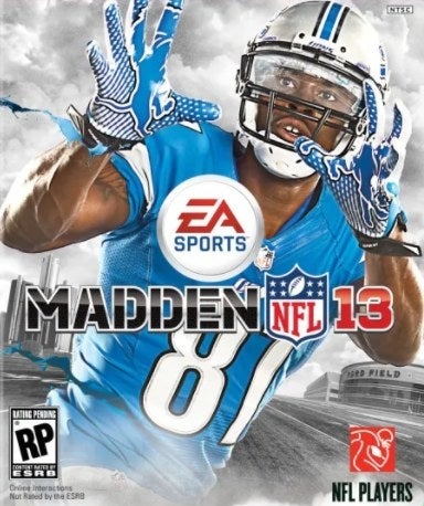 Calvin Johnson in a Detroit Lions uniform with his hands raised to catch a football