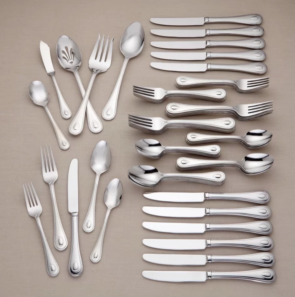 A 65-piece, stainless steel flatware set that is dishwasher safe and can serve up to 12 people