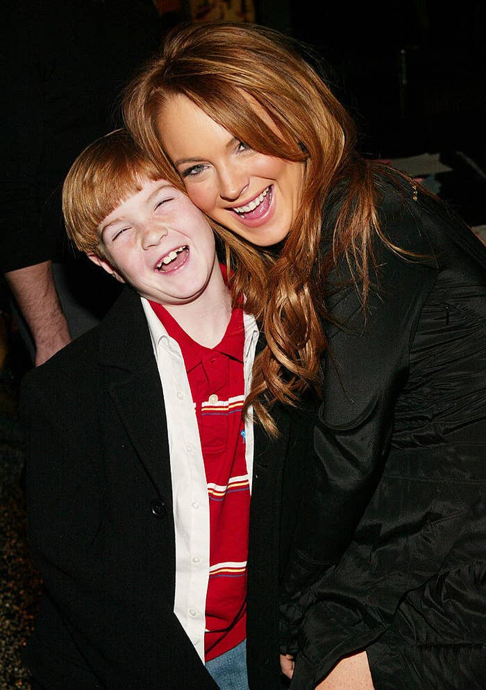 Lindsay Lohan (R) poses with Dakota at the &quot;Confessions Of A Teenage Drama Queen&quot; premiere 
