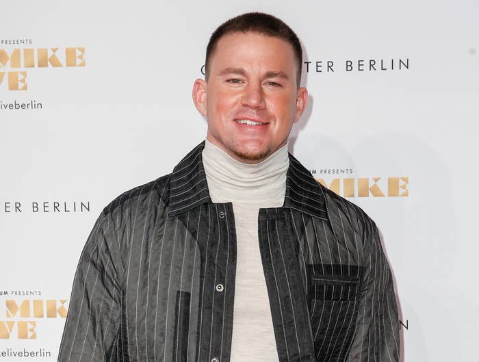 Channing wears a striped jacket and grey turtleneck to an event