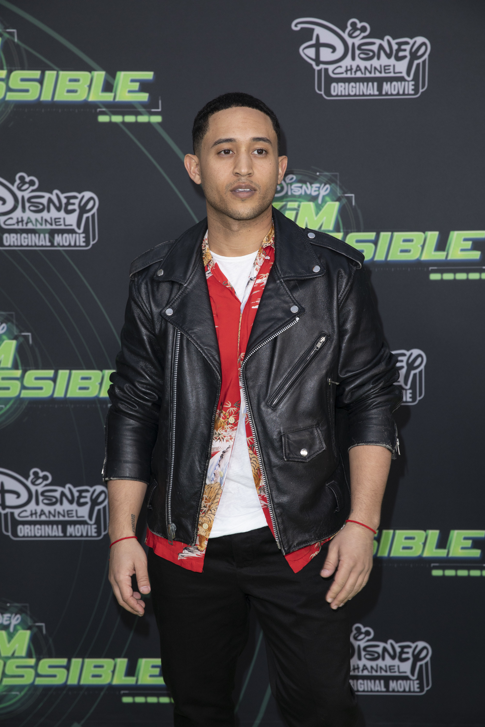 Tahj looks serious while attending an event