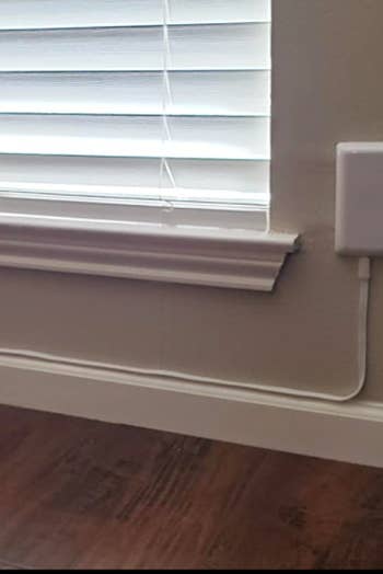 A customer review photo of an outlet using the power strip