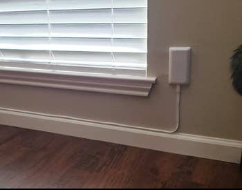 A customer review photo of an outlet using the power strip