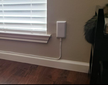 A customer review photo of an outlet using the power strip