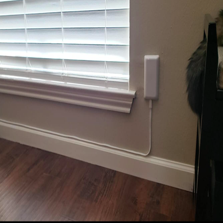 A customer review photo of an outlet using the power strip