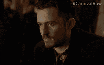 Orlando Bloom raises an eyebrow and opens his mouth in &quot;Carnival Row&quot;