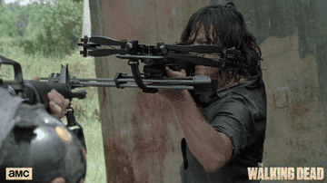 Norman Reedus with a crossbow