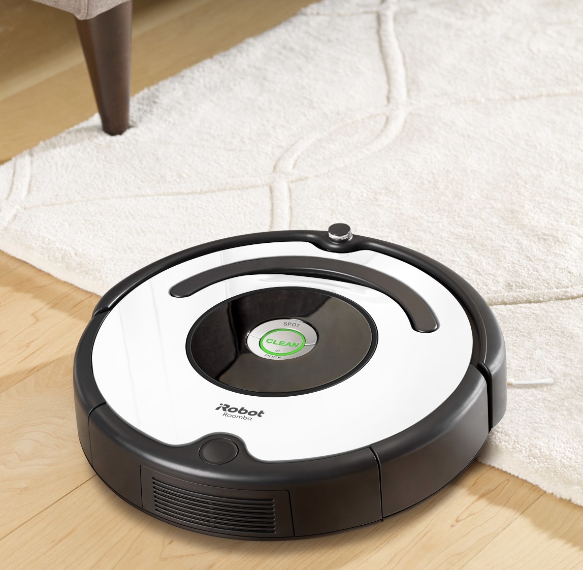 the iRobot roomba in black and white