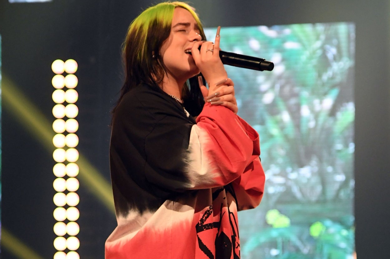 Billie Eilish sings onstage