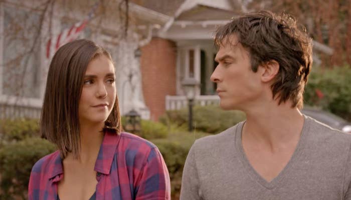 Elena and Damon take a walk around the neighborhood together, looking into each other&#x27;s eyes