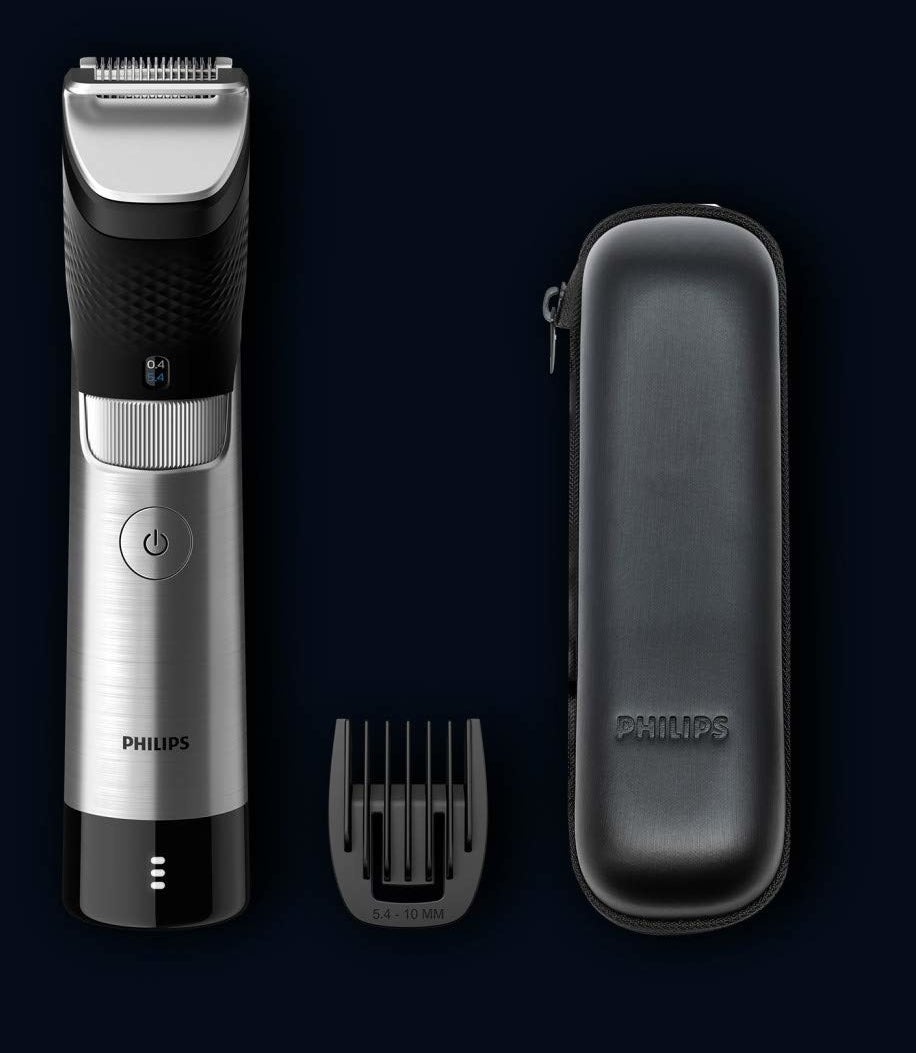 Silver and black electric razor with black shaving head and case