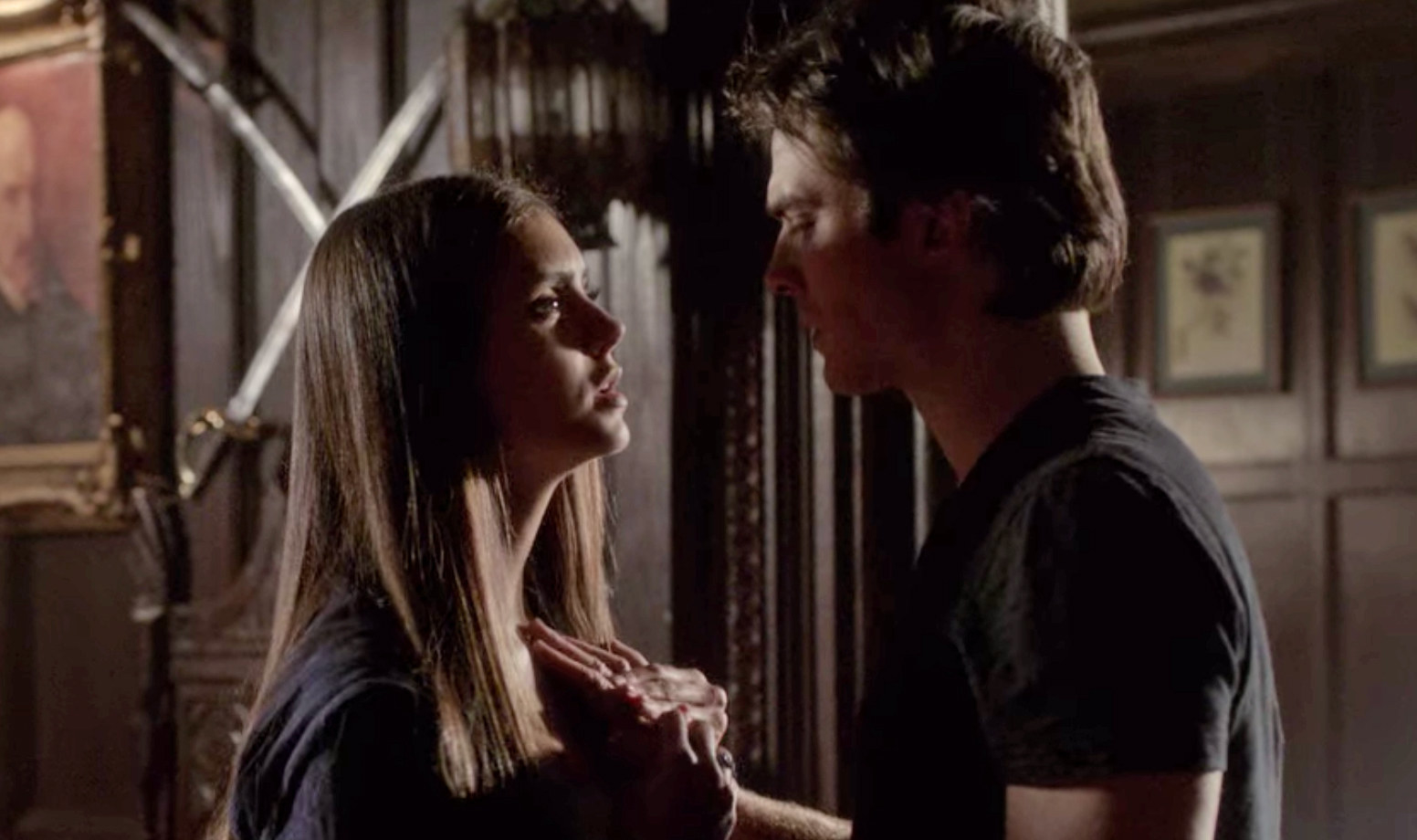 Elena holds Damon&#x27;s hand to her heart