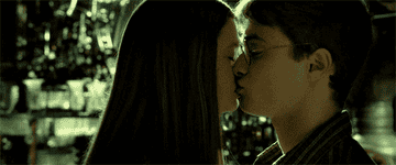 Ginny kissing Harry