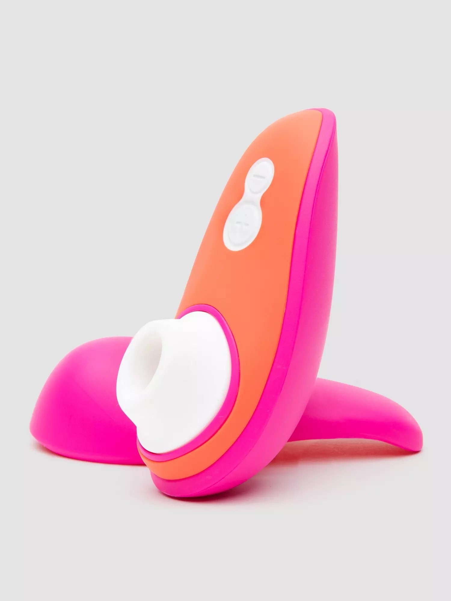 Orange and hot pink suction vibrator and hot pink travel cover