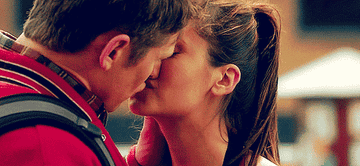 Matt and Elena kissing in a flashback from episode 3x22.