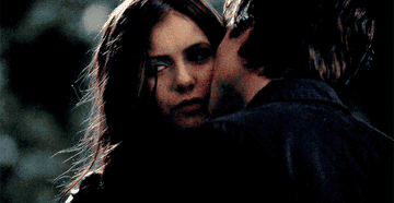 Damon kisses Katherine (who he believes is Elena) on the cheek during the season 1 finale.
