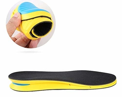 A black and yellow memory foam insole, with an inset of a person rolling it up.