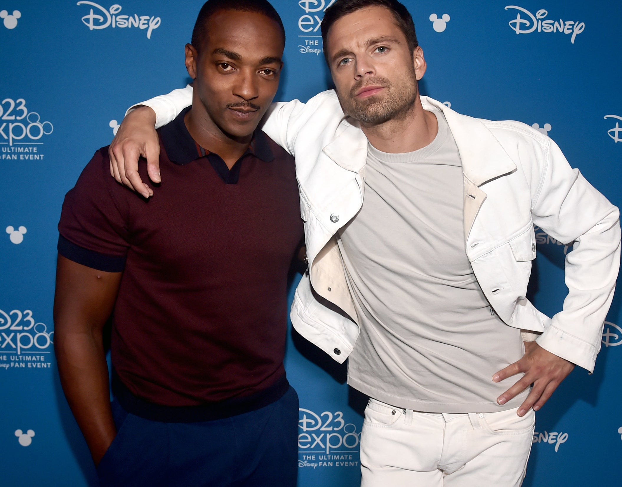 Sebastian Stan, who plays Bucky, puts his arm around Anthony at an event