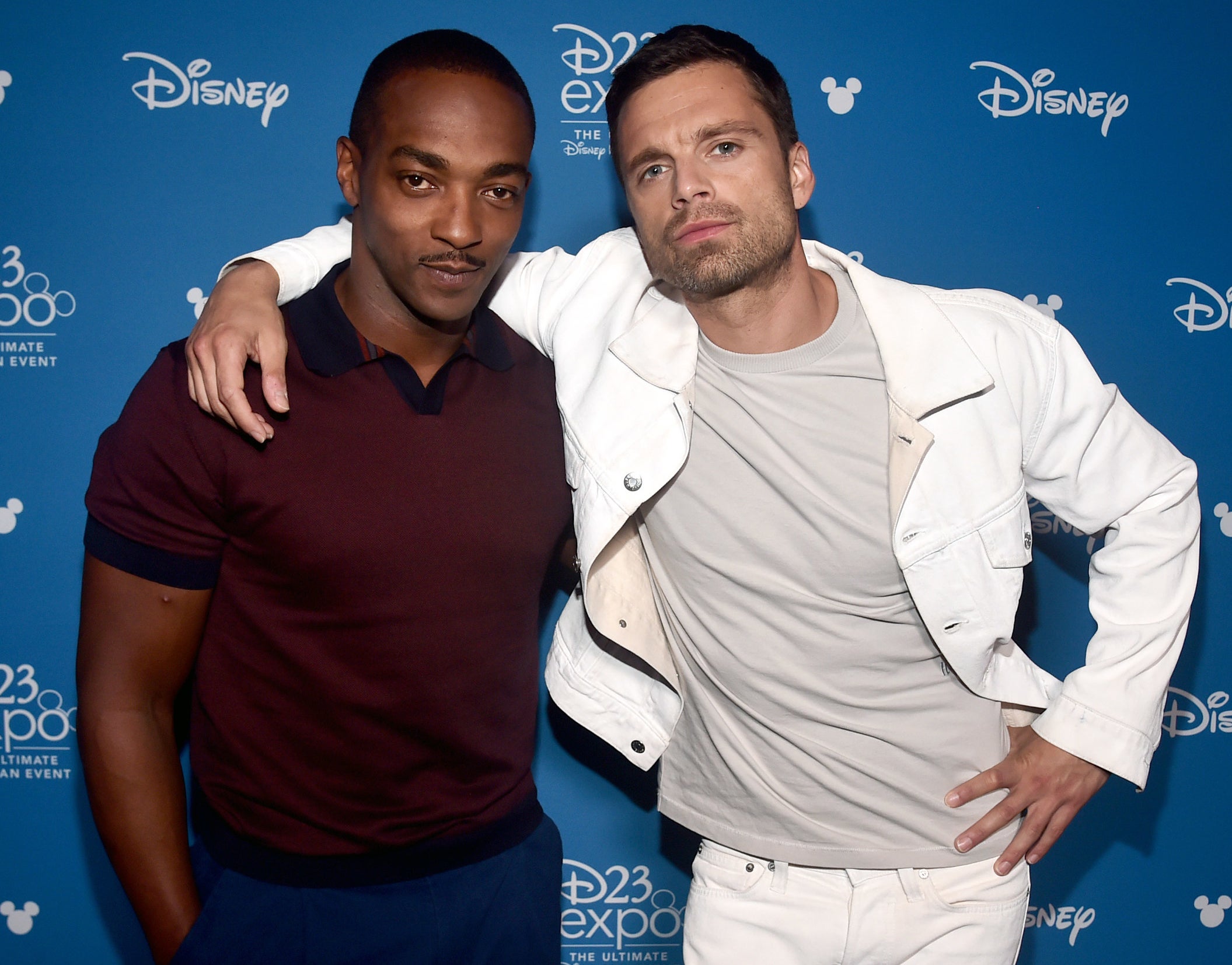 Sebastian Stan, who plays Bucky, puts his arm around Anthony at an event