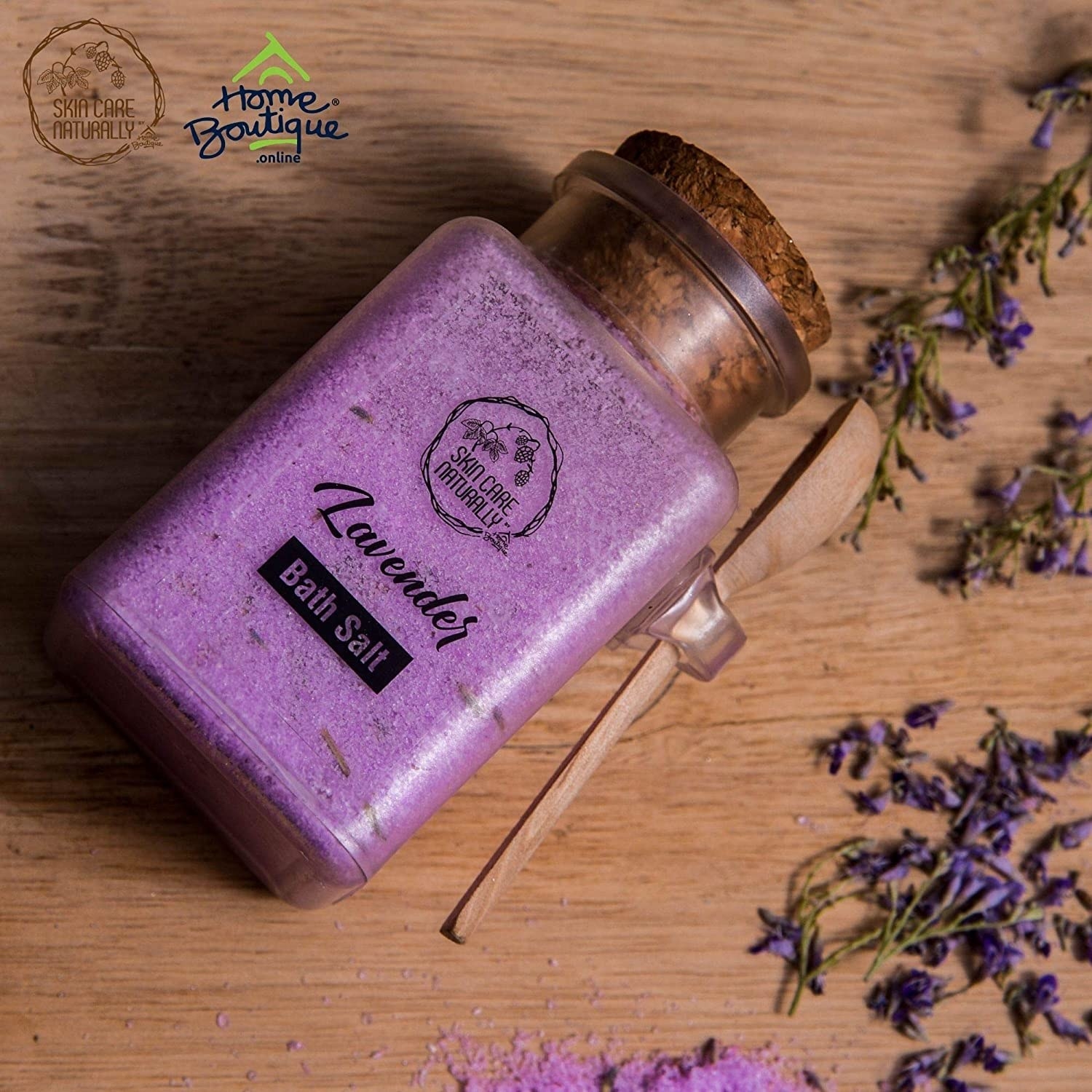 Lavender bath salts in a glass bottle with a cork