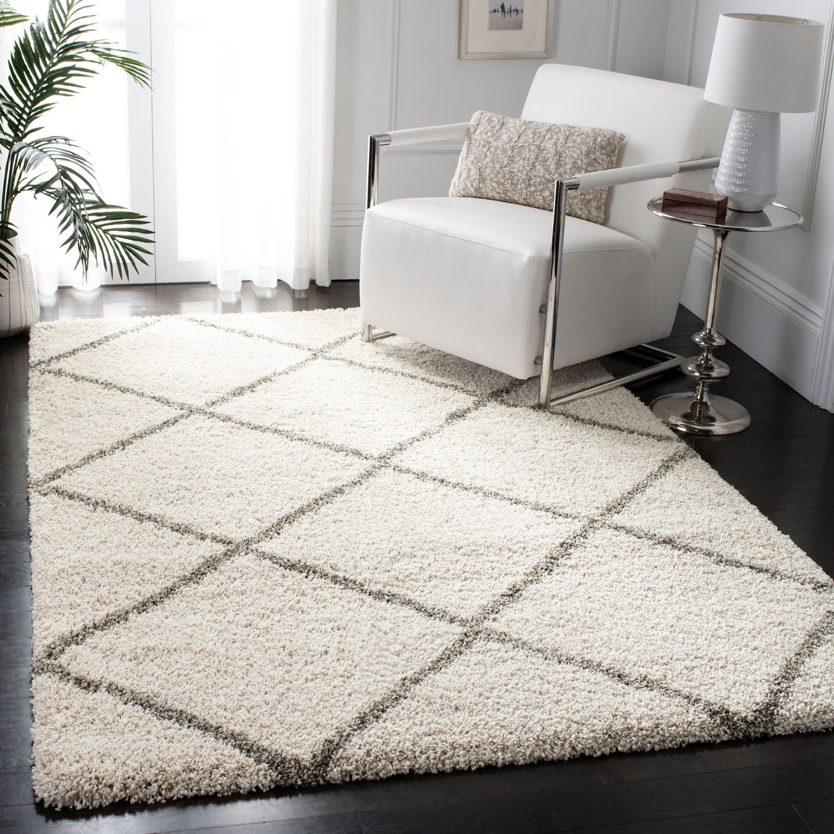 The rug in a living room with a triangular geometric pattern
