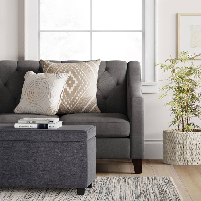 The ottoman in gray, in a living room 